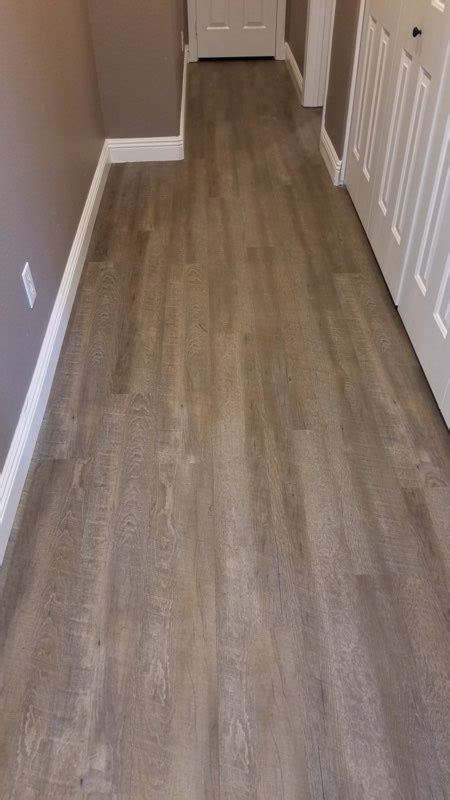 It's gorgeous, is extremely durable, is affordable, and it comes in an endless array of colors and patterns. Vinyl Plank Is Perfect Choice for This Vegas Home | Empire ...