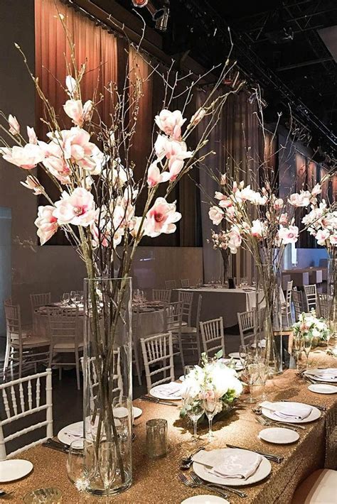 Tall Wedding Centerpieces In A Clear Even Vase Wooden Branches With