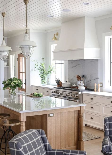 The All White Kitchen Is Giving Way To One With A Blend Of Tones And