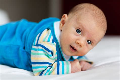 Baby Lying On A Belly Free Stock Photo Public Domain Pictures