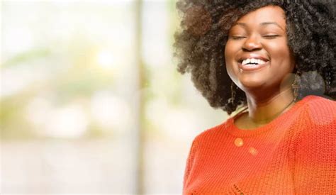 Beautiful African Woman Confident And Happy With A Big Natural Smile