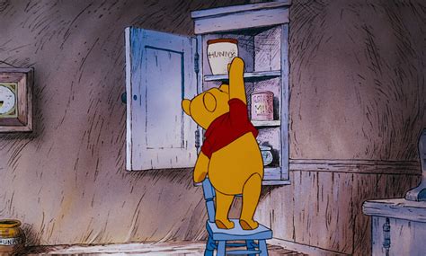 Image Winnie The Pooh Is Reaching The Honey Pot In The Cupord Disney Wiki Fandom