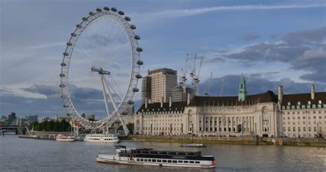 View Of A Giant Ferris Wheel London Eye And River Thames On A Cloudy