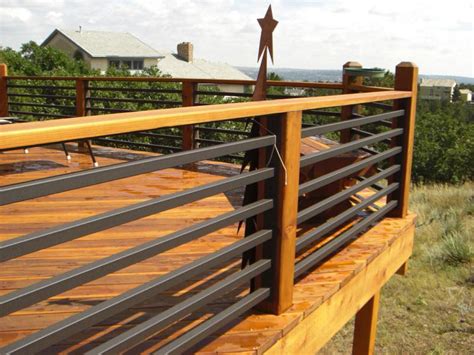 The best looking deck rail design is made by our master crafters with the branches of the mountain laurel tree. Deck Railings | Colorado Springs | Decks By Schmillen