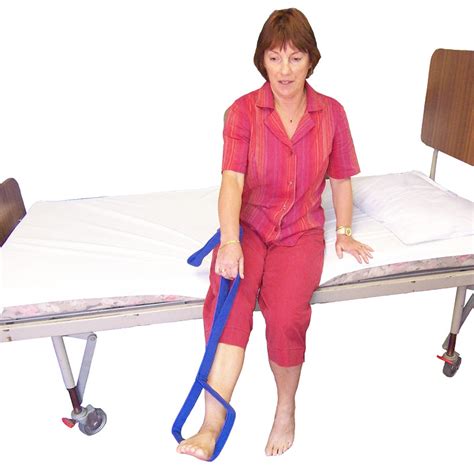 Leg Lifter With A Stiff Stem To Help Lift A Leg Onto A Bed
