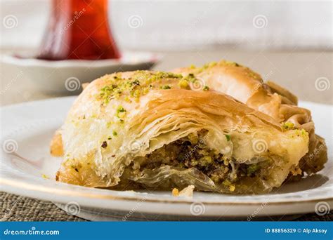 Turkish Baklava Sobiyet With Pistachio And Tea Stock Image Image Of