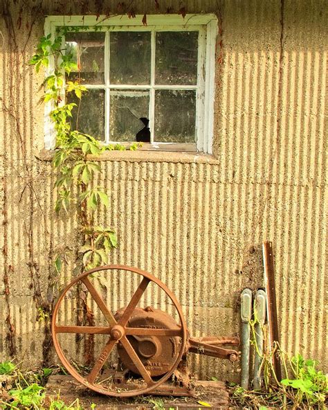 Rusty Wheel Photograph By Lawrence Golla