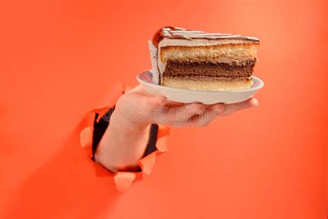 Hand Giving A Piece Of Chocolate Cake Stock Photo Image Of Frosting