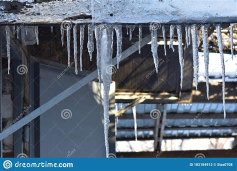 Icicles On Roof In Sunny Winter Day Stock Photo Image Of Helmet