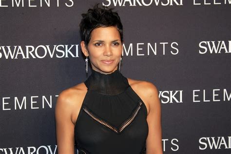 Halle Berry Showing Off Her Curves In Skin Tight Black Dress At