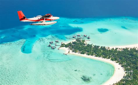 Sea Plane Flying Above Maldives Islands Photograph By Jag Cz Pixels