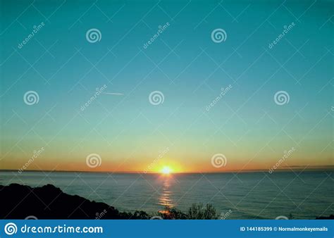 Arty Teal Sunrise Stock Image Image Of Land Ocean 144185399