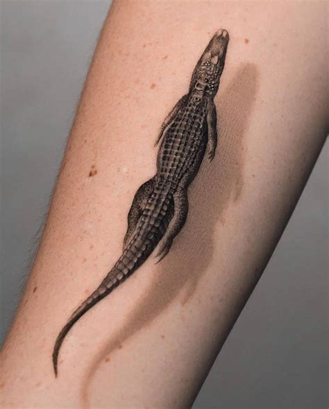 Micro Realistic Style Alligator Tattoo Located On The