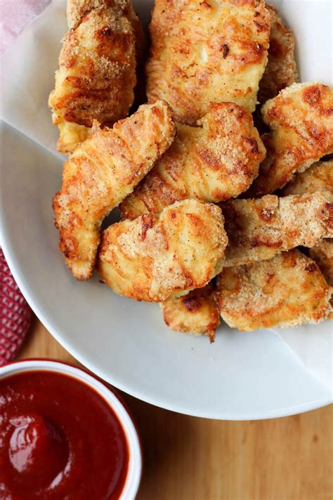 Yields crispy on the outside, juicy on the inside, better than kfc chicken! Oven-Baked Chicken Fingers - Stephanie Kay Nutrition