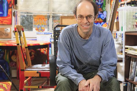 Asperger's syndrome is a developmental disorder characterized by difficulties in communication and social interaction. Man with Asperger syndrome in art studio - Stock Image ...