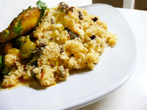 Pour the couscous into a gasaa (a large container of couscous) sprinkle with a mixture of water and salt and rub gently between the hands to loosen the seeds. Moroccan Couscous - Partial Ingredients