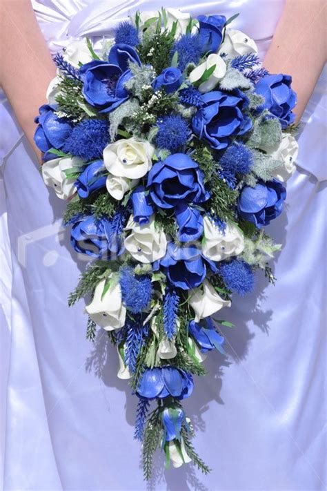 Mother of the brides corsage needs to be extra special with pearls and glitz, this can match either her outfit or her daughters theme but should always. Scottish Inspired Royal Blue Anemone, Heather, Thistle and ...