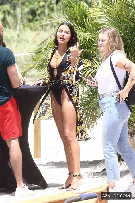 Olivia Culpo In A Barely There Black One Piece Swimsuit As She Arrives