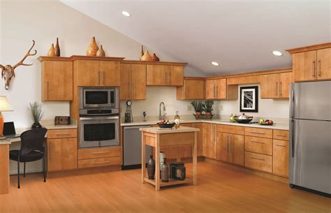 The first tip for choosing kitchen cabinet door styles is about the material you would like. Door style: Sonoma, Wood Species: Maple, Finish: Honey ...