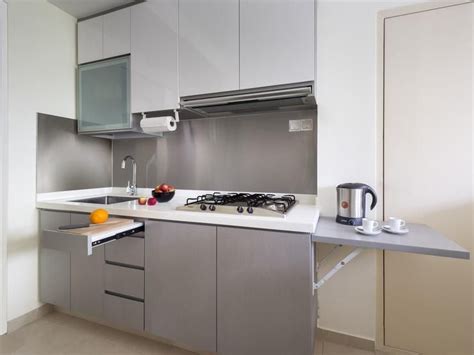 A Small Condo Unit Packed With Space Saving Ideas Small Space Kitchen