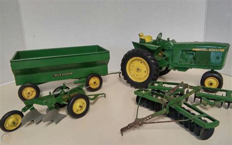 Vintage Metal John Deere Tractor Toy Farm diecast 1/16 scale with metal rear... | #1916826850