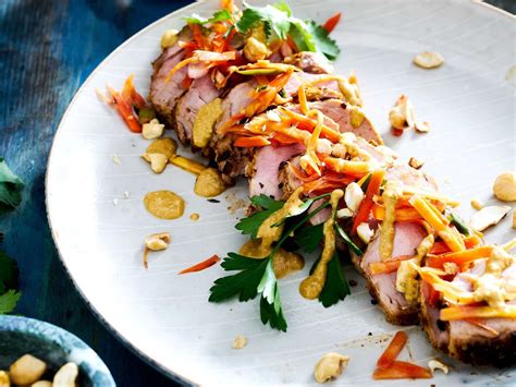 There is plenty of food and most of which are displayed very nicely. Pickled carrots highlight this Asian roasted pork dish ...