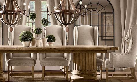 Wingback elek dining chair (set of 2) by red barrel studio®. Dining room with double chandelier, topiary centerpiece ...