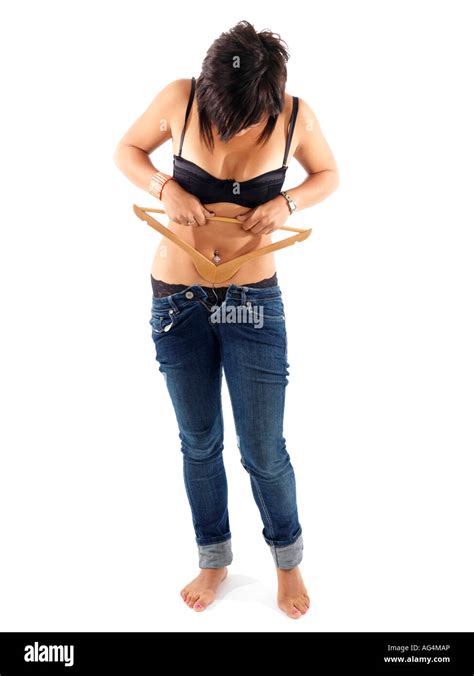 Woman Putting On Tight Jeans Hi Res Stock Photography And Images Alamy