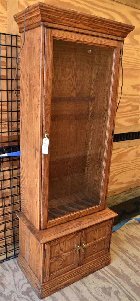 Maybe you would like to learn more about one of these? Jasper Cabinet Company Oak Gun Cabinet - Landsborough Auctions