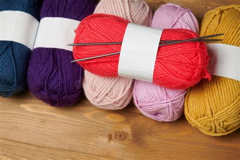 Colorful Wool Yarn For Knitting On Wooden Background Stock Photo