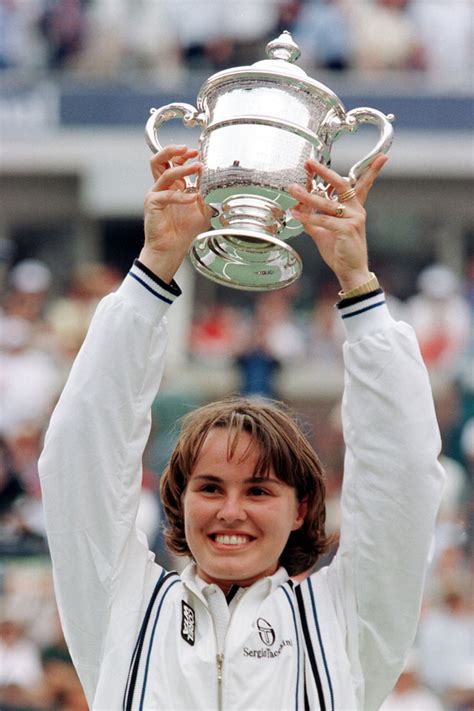 martina hingis poses with her trophy after beating venus williams in straight sets 20 years ago