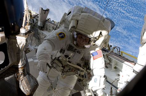 Astronauts Conduct Spacewalk On Historic Anniversary International