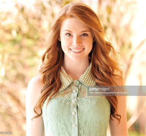 beautiful redhead with a girl next door look her light brown eyes