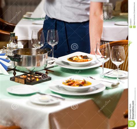Waiter Serving Food At Restaurant Royalty Free Stock Photography - Image: 21066477
