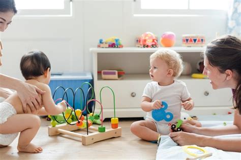 Premium Photo Babies Playing Together In A Play Room