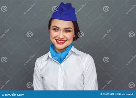 Professional Occupation Stewardess Standing Isolated On Grey Smiling