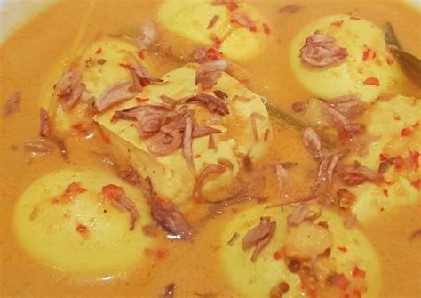 • 6 butir telur • 10 buah tahu • 1 ruas lengkoas • 1 ruas jahe • 1/4 ketumbar bubuk • 1/4 kunyit bubuk • daun salam • 1 batang sereh • 4 siung bawang putih • 5 siung bawang merah • cabai merah secukupnya • 1 sdm penyedap rasa • 1 sdm gula • 1 sdm garam. Resep Gulai Telur Tahu Padang oleh Dominique Astrid - Cookpad