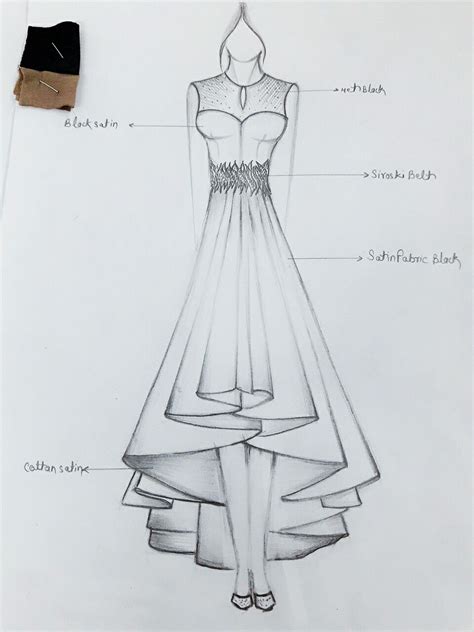 A Drawing Of A Dress That Is On Top Of A Piece Of Paper