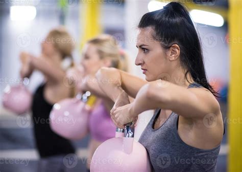 Athletes Doing Exercises With Kettlebells 11280863 Stock Photo At Vecteezy