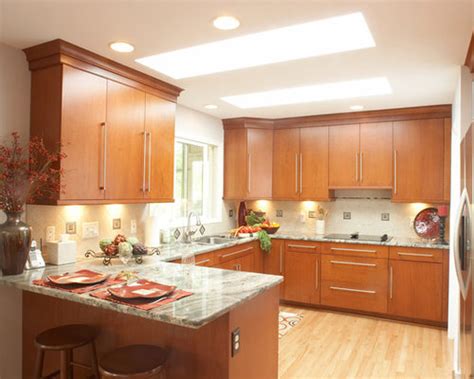 Cherry wood cabinets from crystal kitchen + bath feature a warm, color that intensifies when exposed to light. Light Cherry Cabinets | Houzz