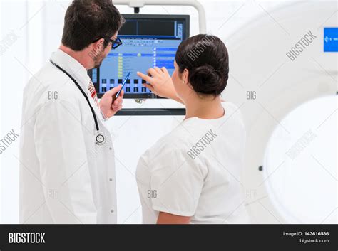 Doctor Nurse Analyzing Image And Photo Free Trial Bigstock