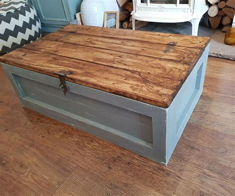 This coffee table provides extra storage for board games, blankets, or anything else you need for your living room. Wooden Chest Trunk Large Storage Toy Box Coffee Table ...