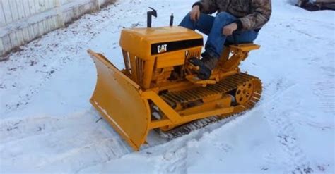 This Caterpillar Mini Dozer Is A Fully Functional Snow Plow Altdriver