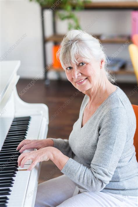 Woman Playing Piano Stock Image C0346317 Science Photo Library