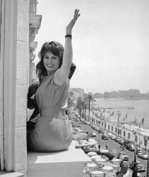 Italian Film Star Sophia Loren Poses On The Window Ledge Of Her Hotel