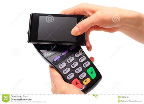 It is especially helpful for businesses that are on the go, and small businesses that operate out of their home. Hand Of Woman Paying With NFC Technology On Mobile Phone Stock Photo - Image of electronics ...