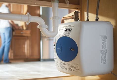 Kitchen sinks have a strainer fitted into a strainer body that's inserted down through the sink hole and sealed to the sink with a bead of plumber's putty. On-Demand Water Heater Installation Guide at The Home Depot