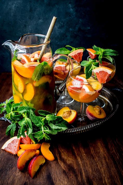 Enjoy this simple recipe to make at home any night of the week! Peach Bellini Sangria | Recipe | Summer punch recipes ...