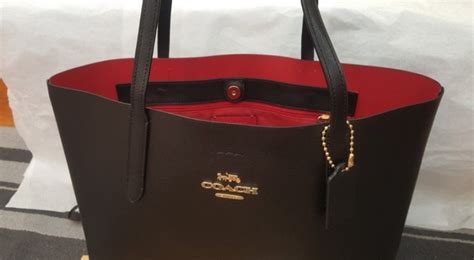 Bag is the same as what is in the picture. Restock: BRAND NEW Black Coach Leather Tote Bag with Red ...