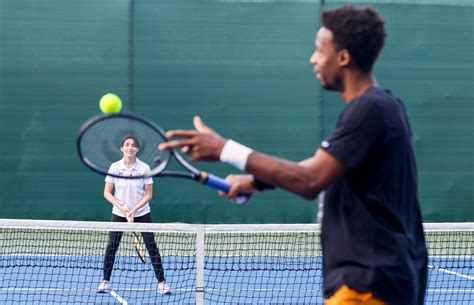 Tennis star Gaël Monfils warms up against Emirati racing star Amna